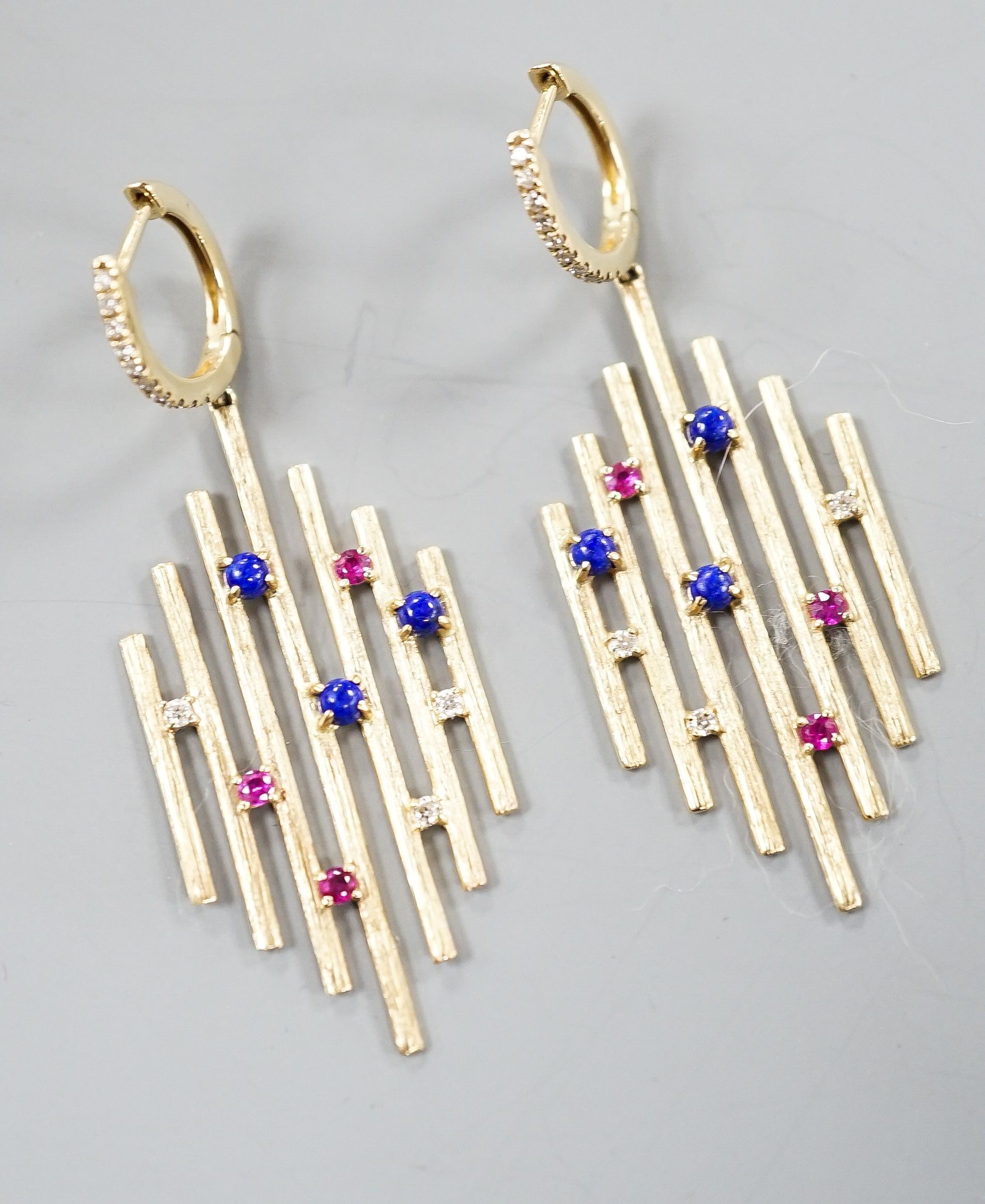 A pair of modern 585 yellow metal, ruby, lapis lazuli and diamond set Dynasty earrings, overall 48mm, gross weight 6.4 grams.